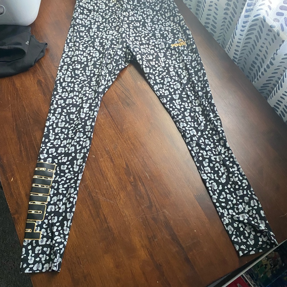 Puma Black and White Patterned Leggings with Gold Logo